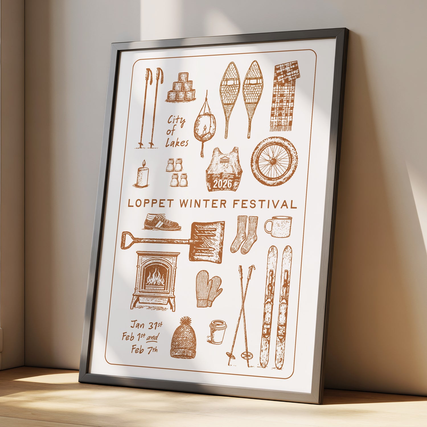 Framed poster of Loppet Winter Festival with winter-themed illustrations on a light background