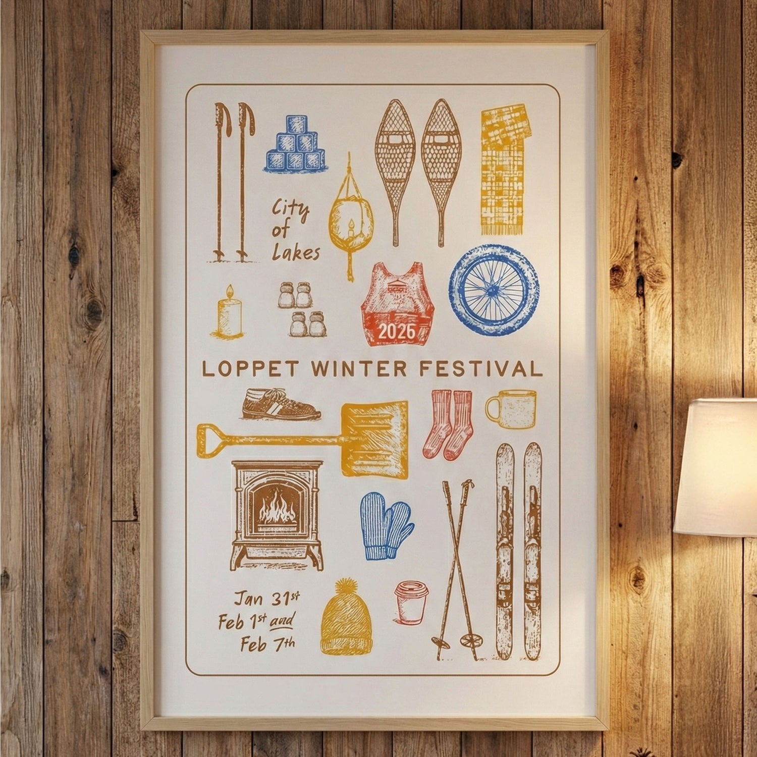 Framed poster for Loppet Winter Festival on a wooden wall.
